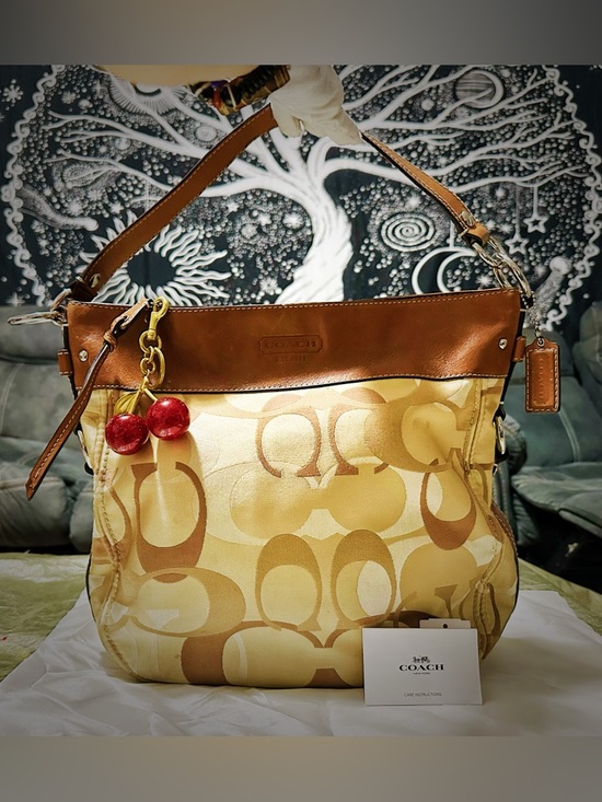 Rare vintage Coach soho Shoulder Bag Tan Signature Logo with Cherry Charm
